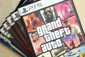 KYIV, UKRAINE - JUNE 26, 2024 Grand Theft Auto 6 PS5 game disc box for console gaming. Fictional fan-made game disc pack cover photo