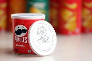 KYIV, UKRAINE - FEBRUARY 27, 2024 Pringles original potato chips on white background photo