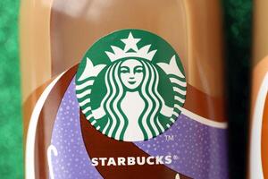 KYIV, UKRAINE - APRIL 20, 2024 Starbucks Frappuccino Coffee Drink. Seattle based Starbucks is the largest coffeehouse company in the world, with over 20,000 stores photo