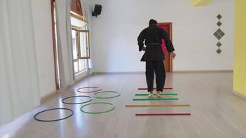 Man Train With Jumping Obstacle Exercises During Karate Training video