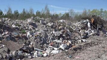 Pollution concept. Garbage pile in trash dump or landfill. Global damage environmental. Construction debris. video