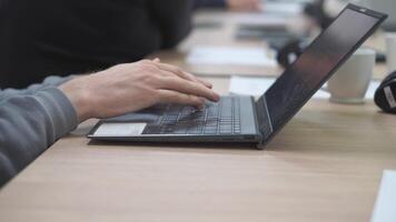 Female hands of business woman professional user worker using typing on laptop notebook keyboard sit at home office desk working online with pc software apps technology concept, close up side view video