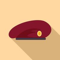 Red military beret with a yellow insignia lying on light background vector