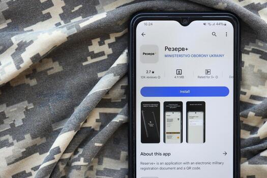 KYIV, UKRAINE - JUNE 20, 2024 Rezerv plus - ukrainian application for smartphone with actual personal information about conscript status for military recruits photo