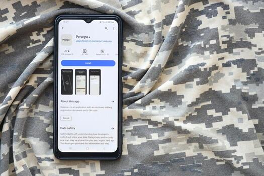 KYIV, UKRAINE - JUNE 20, 2024 Rezerv plus - ukrainian application for smartphone with actual personal information about conscript status for military recruits photo