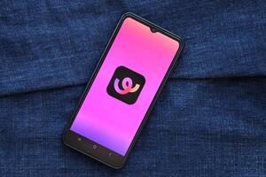 KYIV, UKRAINE - JUNE 20, 2024 Whee is instagram-like application for asian smartphone users for sharing photos between friends