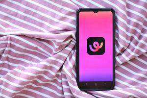 KYIV, UKRAINE - JUNE 20, 2024 Whee is instagram-like application for asian smartphone users for sharing photos between friends