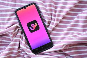 KYIV, UKRAINE - JUNE 20, 2024 Whee is instagram-like application for asian smartphone users for sharing photos between friends