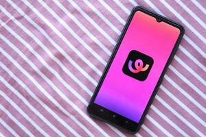 KYIV, UKRAINE - JUNE 20, 2024 Whee is instagram-like application for asian smartphone users for sharing photos between friends