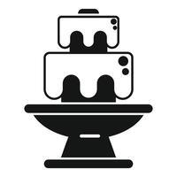 Chocolate fountain cascading on a stand vector