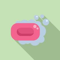 Pink soap bar floating on blue foam with bubbles vector