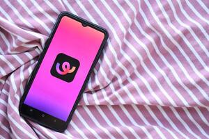 KYIV, UKRAINE - JUNE 20, 2024 Whee is instagram-like application for asian smartphone users for sharing photos between friends