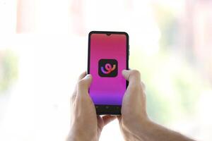 KYIV, UKRAINE - JUNE 20, 2024 Whee is instagram-like application for asian smartphone users for sharing photos between friends