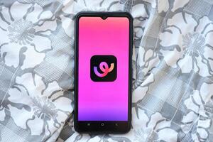 KYIV, UKRAINE - JUNE 20, 2024 Whee is instagram-like application for asian smartphone users for sharing photos between friends