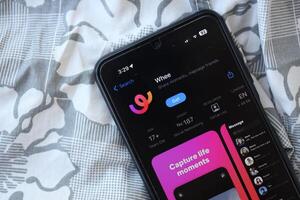 KYIV, UKRAINE - JUNE 20, 2024 Whee is instagram-like application for asian smartphone users for sharing photos between friends