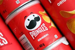 KYIV, UKRAINE - FEBRUARY 27, 2024 Pringles original potato chips on white background photo