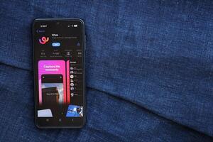 KYIV, UKRAINE - JUNE 20, 2024 Whee is instagram-like application for asian smartphone users for sharing photos between friends