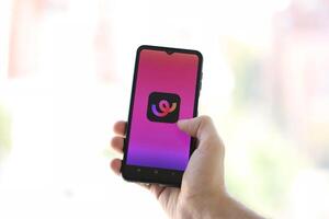 KYIV, UKRAINE - JUNE 20, 2024 Whee is instagram-like application for asian smartphone users for sharing photos between friends