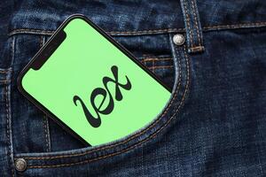 KYIV, UKRAINE - FEBRUARY 23, 2024 Lex logo of famous dating website or app on iPhone display photo