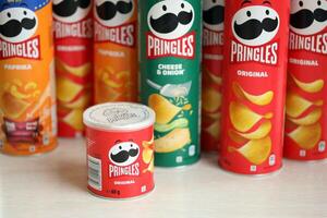 KYIV, UKRAINE - FEBRUARY 27, 2024 Pringles original potato chips on white background photo