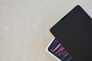 KYIV, UKRAINE - 4 MAY, 2023 Apple ipad 2022 with 12.9 inch diagonal display resolution on m2 processor core photo