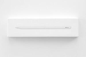 KYIV, UKRAINE - 4 MAY, 2023 New Apple pencil generation 2. Features a flat edge that attaches magnetically for automatic charging and pairing photo