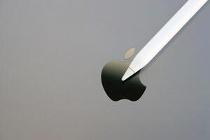 KYIV, UKRAINE - 4 MAY, 2023 Apple pencil generation 2 lies on surface of Ipad photo