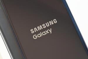 KYIV, UKRAINE - 4 MAY, 2023 Samsung Galaxy A04 Android smartphone has 6.5-inch PLS LCD panel with Infinity-V design photo