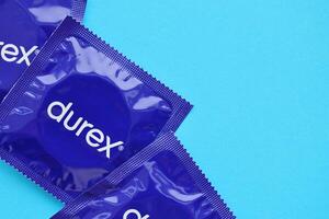 KYIV, UKRAINE - NOVEMBER 27, 2023 Durex blue condoms pack with logo photo