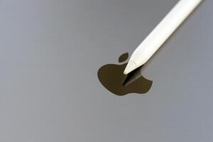 KYIV, UKRAINE - 4 MAY, 2023 Apple pencil generation 2 lies on surface of Ipad photo
