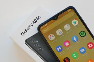 KYIV, UKRAINE - 4 MAY, 2023 Samsung Galaxy A04 Android smartphone has 6.5-inch PLS LCD panel with Infinity-V design photo