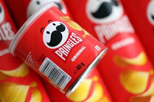 KYIV, UKRAINE - FEBRUARY 27, 2024 Pringles original potato chips on white background photo