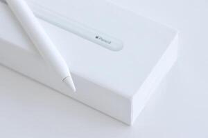 KYIV, UKRAINE - 4 MAY, 2023 New Apple pencil generation 2. Features a flat edge that attaches magnetically for automatic charging and pairing photo