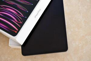 KYIV, UKRAINE - 4 MAY, 2023 Apple ipad 2022 with 12.9 inch diagonal display resolution on m2 processor core photo