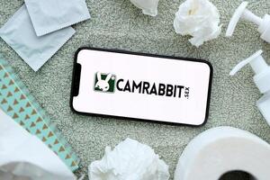 KYIV, UKRAINE - JANUARY 23, 2024 CamRabbit adult content website logo on display of iPhone 12 Pro photo