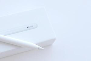 KYIV, UKRAINE - 4 MAY, 2023 New Apple pencil generation 2. Features a flat edge that attaches magnetically for automatic charging and pairing photo