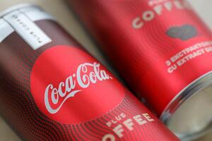 KYIV, UKRAINE - OCTOBER 31, 2023 Can of Coca Cola with coffee flavor. Closed tin can of drink with special design photo
