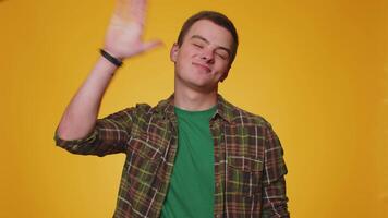 Boy showing inviting gesture with hands, ask to join, beckoning to coming gesturing hello or goodbye video