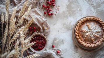 Boho top view Thanksgiving day with brown pumpkin pie and leaves photo