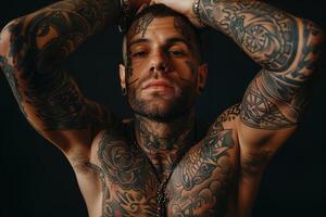 Tattooed man portrait against dark background photo