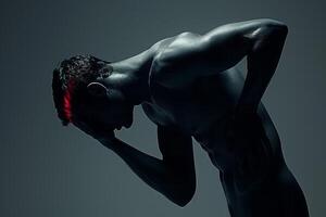 Man experiencing intense headache and back pain photo