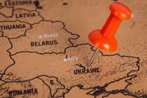 Red Pin Marking Ukraine on Map photo