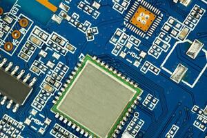 Microchip on Blue Circuit Board photo