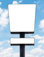 Mock up white vertical and horizontal light box billboard on pole with blue sky background. Clipping path for mockup photo