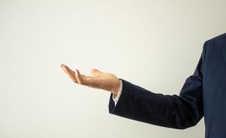 hand palm up against white background, copy space photo