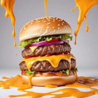 Delicious burger with many ingredients isolated on white background Tasty cheeseburger splash sauce photo