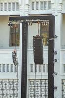 a pair of rigging, lighting, and line array speakers at a concert or large open-air performance photo
