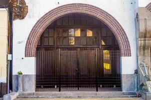 old and classic big door in an old European style building from the Dutch colonial era in Indonesia photo