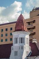 an old tower building in the style of the Dutch colonialism era in Indonesia during the world war era photo