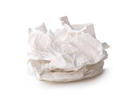 Front view of screwed or crumpled tissue paper balls after use isolated on white background with clipping path photo